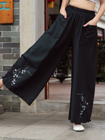 Dark wash straight jeans for women with floral embroidery on hem, desi Eid wear