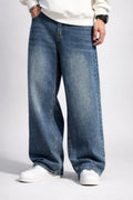 Men wearing baggy blue jeans streetwear