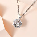 Woman wearing minimal solitaire CZ pendant necklace on silver chain