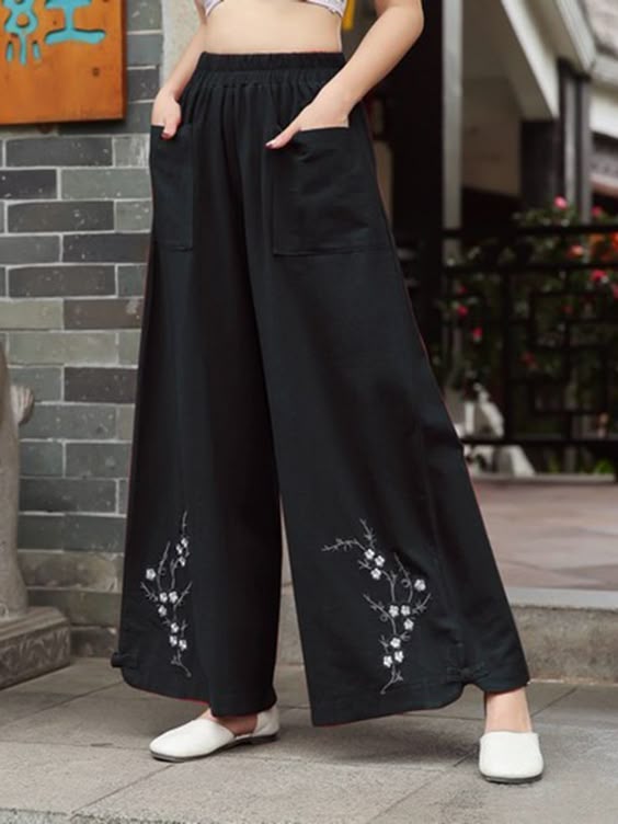  Dark wash straight jeans for women with floral embroidery on hem, desi Eid wear