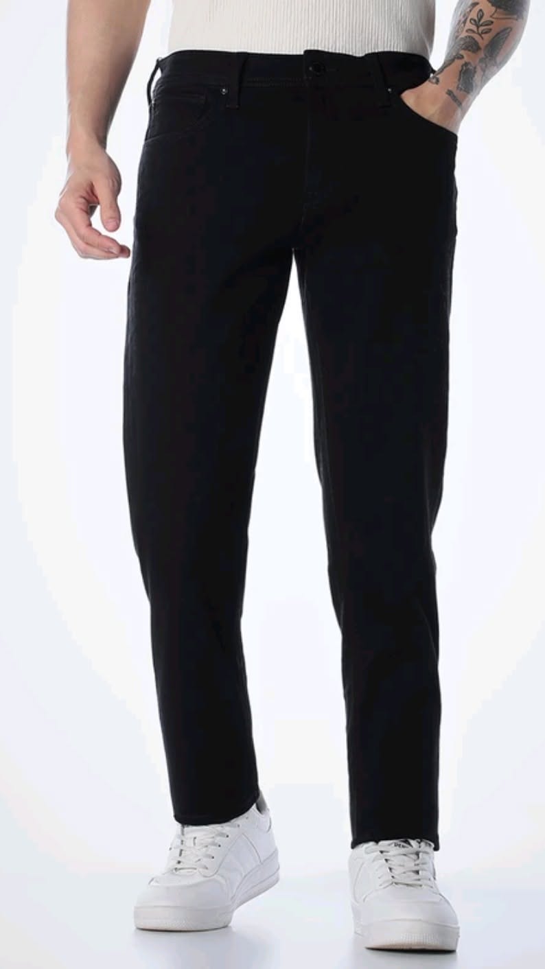 Jet black slim tapered stretch jeans for men, office to club essential mid rise