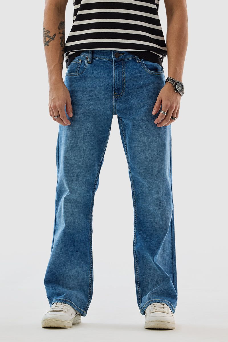 Dark indigo bootcut jeans for men with high rise flare, retro cowboy style button fly