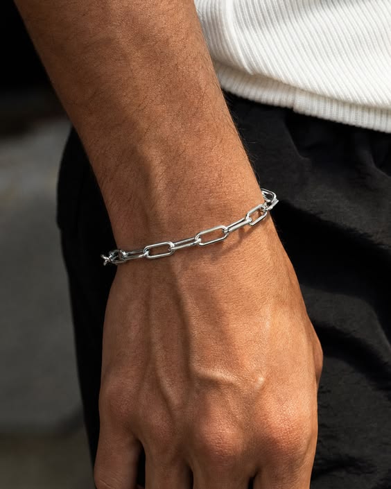 Silver paperclip link bracelet flat lay 