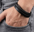  Matte black braided leather bracelet on male wrist 