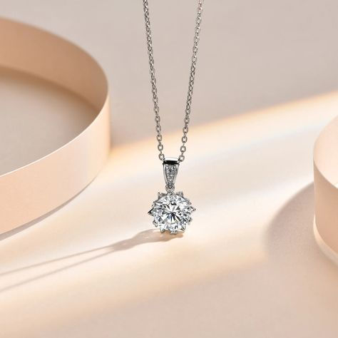 Woman wearing minimal solitaire CZ pendant necklace on silver chain