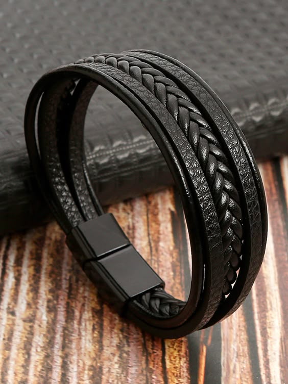  Matte black braided leather bracelet on male wrist 